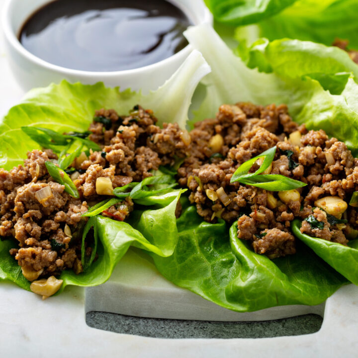 turkey lettuce wraps on white plate