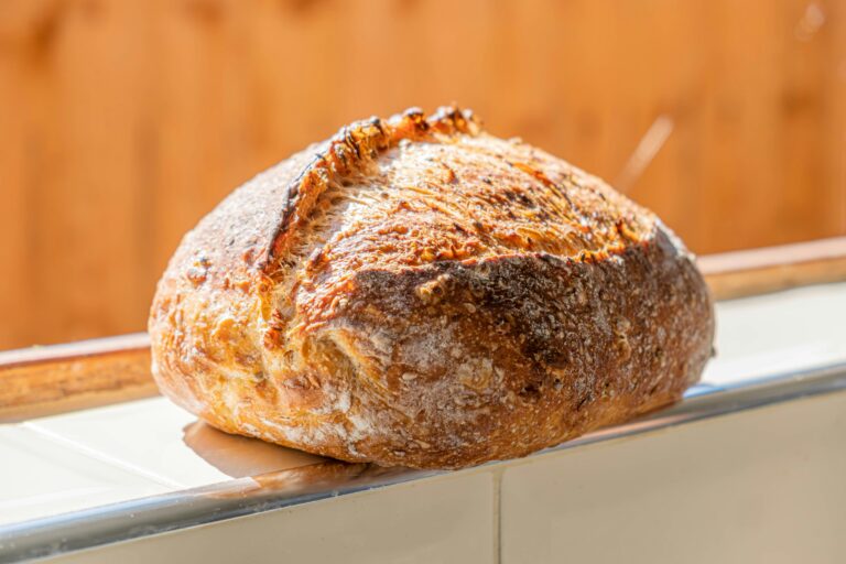 Homemade sourdough bread in windowsill