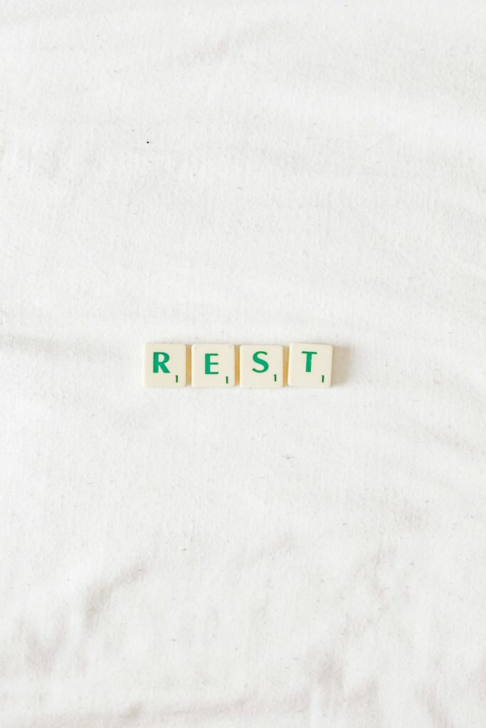 Scrabble letters spelling REST