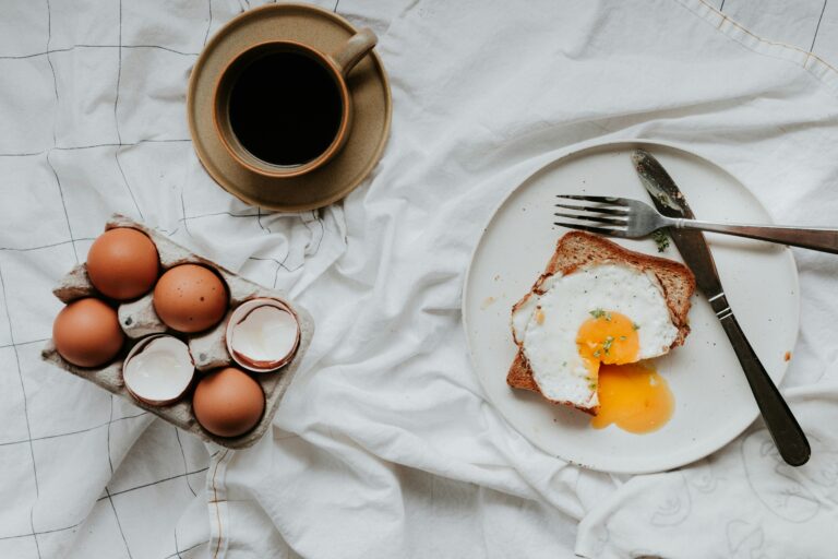 Eggs on toast with coffee