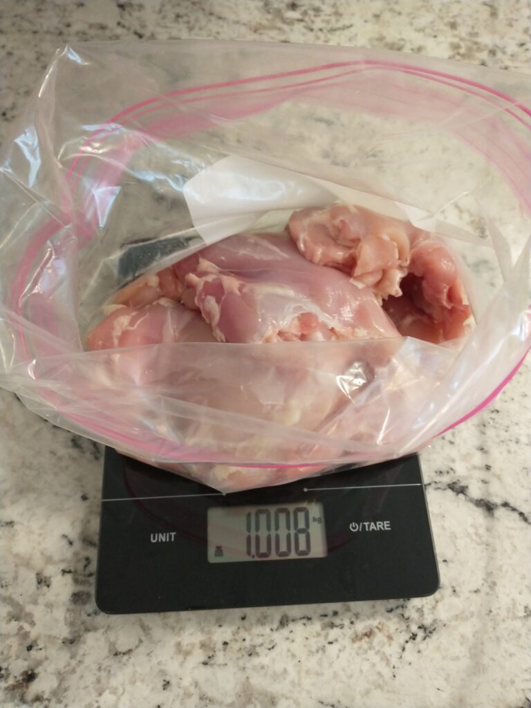 preparing meat for grilled teriyaki chicken thighs